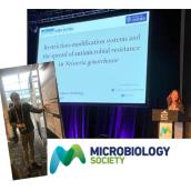 Ana and Kacper presenting at the Microbiology Society conference